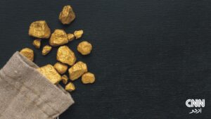 Gold bars stacked in a vault, symbolizing rising gold prices amid the US-China trade war and dollar weakness.