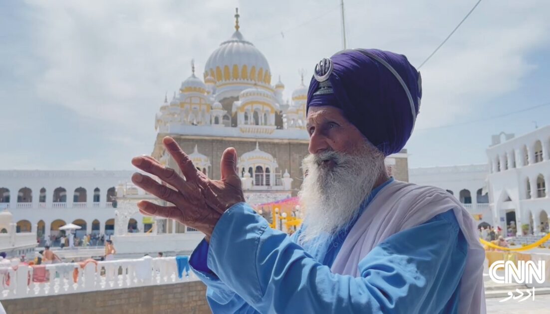 Sikh devotees at Gurdwara Panja Sahib during Vaisakhi celebrations, engaged in prayers and langar service.
