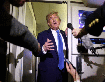 Former U.S. President Donald Trump speaking to reporters aboard Air Force One regarding the Iran-Israel conflict.