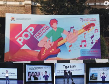 Young Pakistani performers and audience celebrating at the 2025 K-POP Festival hosted by the Korean Embassy in Islamabad.